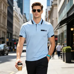 Close-up detail of men's casual polo shirt showing lapel collar and short sleeves on street.