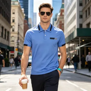 Blue men's polo shirt featuring contrast black collar trim and a stylish chest pocket detail.