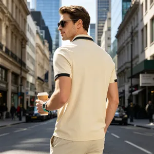 Men's casual polo shirt detail view, featuring short sleeves and contrast collar design.