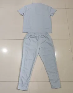 Details of the grey casual waffle two piece set, featuring short sleeves and comfortable pants.