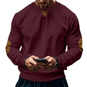 Men's casual long sleeve crewneck sweatshirt with stylish elbow patches and contrast collar detail.