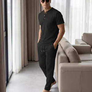Men's waffle knit short sleeve Henley shirt and casual trousers lounge set detail view.