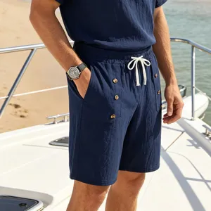 Detail shot of men casual linen shorts with pockets on a yacht deck, perfect for summer.
