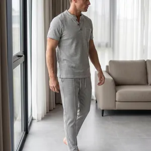 Grey waffle knit short sleeve shirt and trousers detail view, casual lounge set for men.