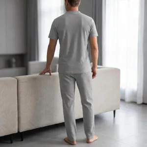 Detailed view of the men's grey waffle knit short sleeve top and casual trousers set.
