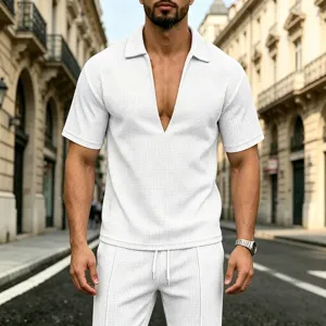 Men summer two piece set casual short sleeve deep v-neck polo shirt and matching trousers.