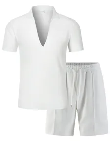 Detailed shot of men's solid white deep V-neck short sleeve top and drawstring shorts set.