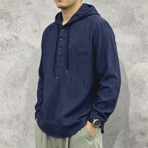 Details of men's linen long sleeve hooded shirt with drawstring and buttons, casual loose top.