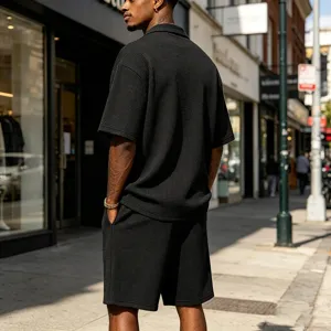 Black waffle knit short sleeve shirt and shorts detail view, casual summer two piece outfit.