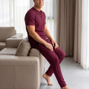 Men waffle knit short sleeve henley shirt and matching pants casual lounge set detail.