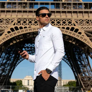 Men's white long-sleeve linen shirt with a chest pocket, casual and breathable vacation style.