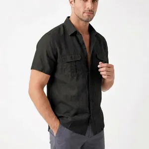 Detailed view of men's black linen short sleeve utility shirt with dual chest pockets.