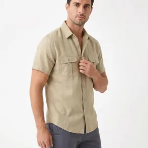 Detailed view of the men's khaki linen short-sleeve utility shirt with dual chest pockets.