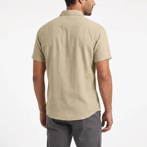 Men's casual beige short sleeve linen blend shirt detail, comfortable summer wear.