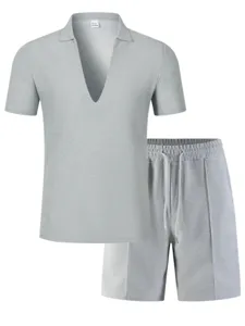 Detail view of men casual waffle V-neck short sleeve top and drawstring shorts sportswear set.