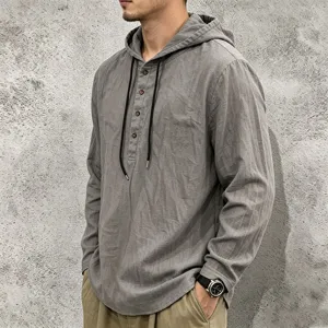Men casual linen hooded long sleeve shirt with drawstrings and front buttons detail view.