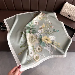 Chic sage green floral silk square scarf with white border, soft satin fashion accessory for women.