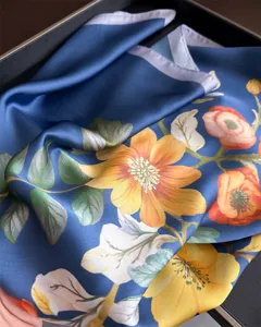 Blue silk square scarf with vibrant floral print, elegant floral neck scarf for women.