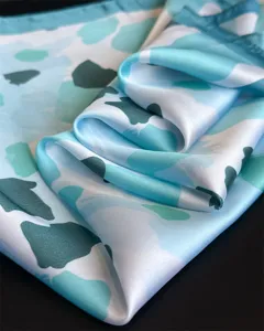 Elegant blue watercolor silk square scarf detail, soft imitation silk fabric texture for women.
