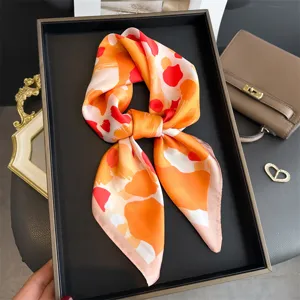 Abstract print satin silk square scarf for women, elegant neckerchief and hair band accessory.