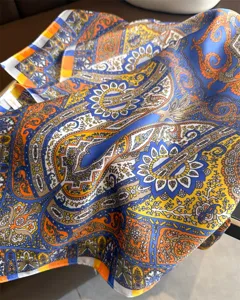 Retro ethnic paisley print silk square scarf, vibrant blue and orange fashion neck shawl.