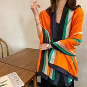 Stylish women's colorblock striped shawl scarf, perfect for versatile daily autumn wear.