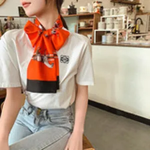 Elegant orange narrow silk scarf with bow design, stylish neckerchief for women and girls.