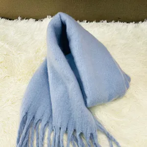 Cozy light blue mohair-style winter scarf with fringe, warm thick solid color shawl for women.