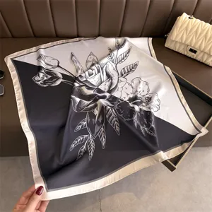 Chic black and white color block floral silk square scarf, elegant neck wrap and shawl.