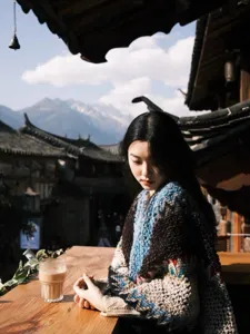 Ethnic style knitted cape detail, traditional travel shawl and outer wear scene showcase.