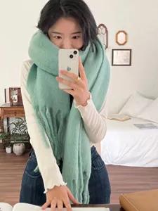 Cozy thick winter mohair tassel scarf for women, soft knitted solid color warm neck wrap style.
