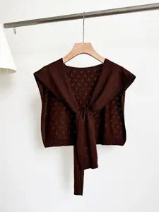 Korean style hollow knit shawl for women, dark brown floral patterned layering cardigan top.