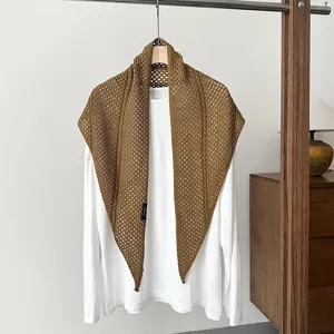Brown wool-blend hollow-out knit triangular shawl scarf for women, elegant layering piece.