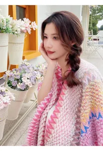 Colorful ethnic knitted shawl cloak detail, bohemian winter warm wrap fashion wear for women.