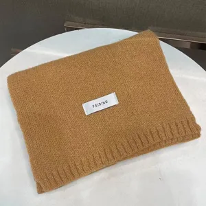 Cozy knitted winter scarf for women, solid color warm neck wrap, elegant casual accessory.