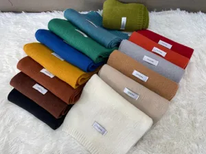 Colorful winter knitted scarf, solid color warm neck wrap for women, stylish cold weather accessory.