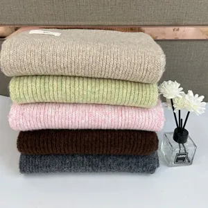 Thickened fluffy knitted scarf detail showing soft texture and cozy color variants stack.