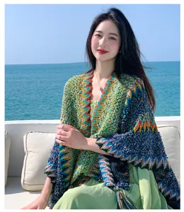 Boho ethnic knit cape shawl for women, colorful wave pattern beach travel outerwear.