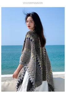 Ethnic knit shawl cloak for women, stylish geometric pattern tassel outerwear for travel beach.