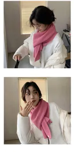 Detailed view of women pink ribbed knit winter scarf, cozy warmth student fashion accessory.