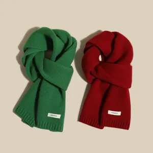 Cozy knit wool scarf detail view, soft winter neck warmer in vibrant colors for women.