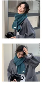 Detailed view of solid color knitted scarf, soft winter warm wool neck wrap for women.