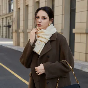 Cozy knitted winter scarf in elegant beige color, soft warm neck warmer for women daily wear