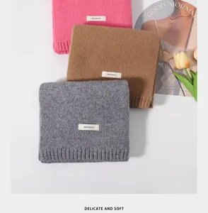 Detailed view of winter warm solid color wool knit scarves in multiple colors for men and women.