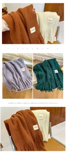 Thick winter knitted scarf with long tassels and soft warm woolen material for students.