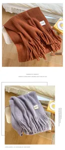 Cozy knit winter scarf with long tassels, soft solid color fashion neck warmer for cold days.