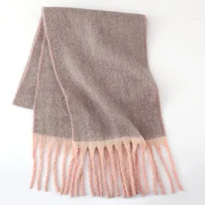 Close-up detail of the soft fuzzy autumn winter scarf showing the texture and fringe design.
