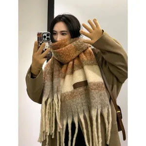 Winter thick plaid fringe mohair scarf worn by woman, cozy daily fashion accessory.