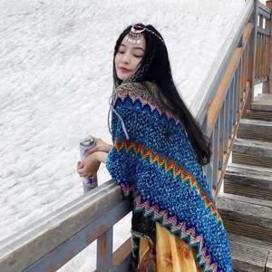 Ethnic style knitted shawl cape for women, colorful geometric pattern outdoor travel outerwear.