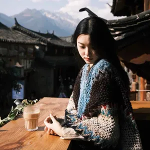 Ethnic style crochet shawl cloak for women, perfect for travel and daily bohemian outfits.